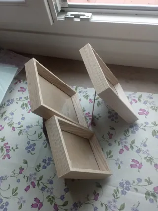 3 Marcos de madera y  cristal para fotos.