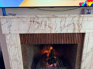 Chimenea de mármol marron y blanco