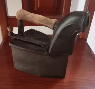 Plancha de carbón antigua