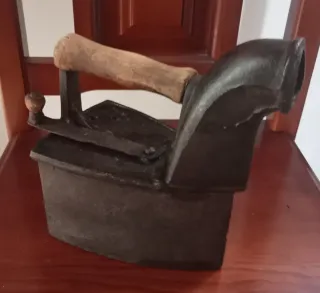 Plancha de carbón antigua