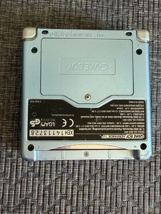 Game Boy Advance SP con scatola e giochi