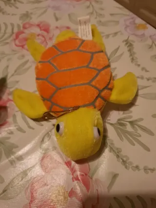 2 peluche (1 con cerniera)