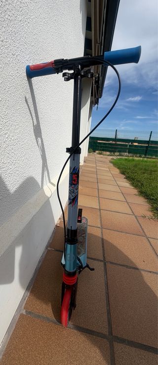 Patinete casi nuevo Oxelo MID5 Azul 6-9 años