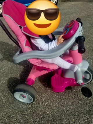 Triciclo infantil rosa y gris