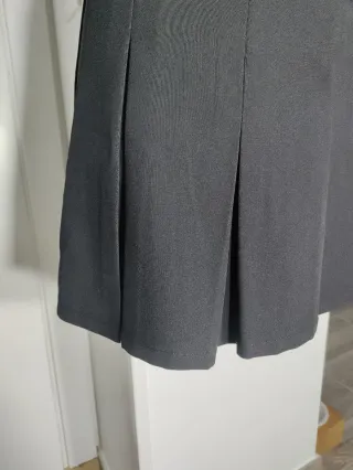 Falda Tiffosi negra plisada con hebillas Talla S