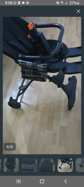 Carrito de bebé negro con estampado