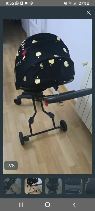 Carrito de bebé negro con estampado