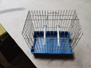 Jaula para mascotas azul y plateada