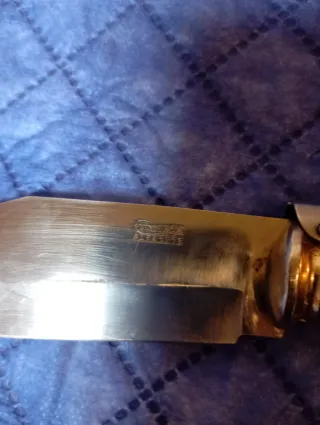 Navaja multiusos de madera y metal