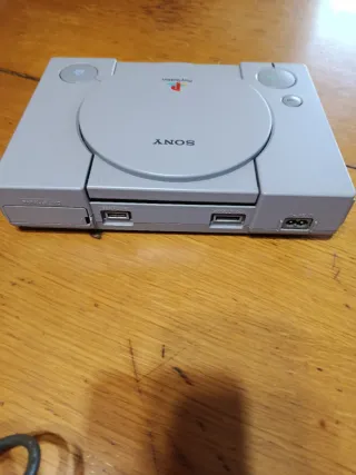 PlayStation 1 gris con mando,cables y memory card