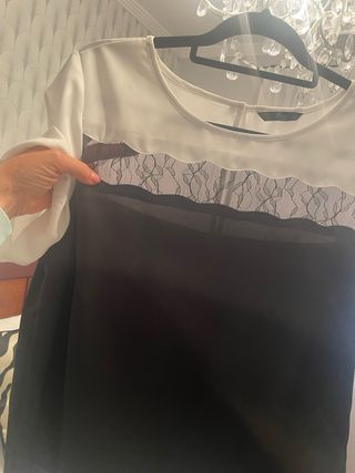Blusa blanca y negra con encaje