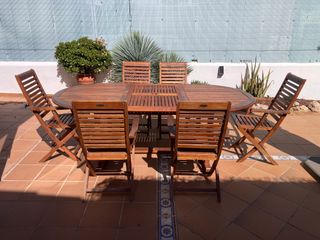 Mesa madera teca extensible con 6 sillas y cojines