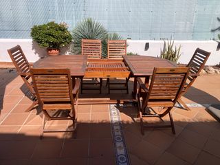 Mesa madera teca extensible con 6 sillas y cojines