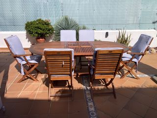 Mesa madera teca extensible con 6 sillas y cojines