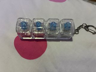 Mini teclado antiestrés con llavero