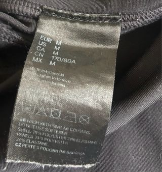 Leggings neri con zip e dettagli riflettenti