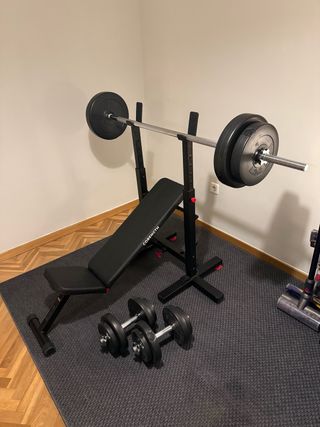 Banco con rack + Barra y mancuernas con pesos