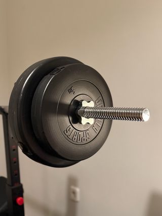 Banco con rack + Barra y mancuernas con pesos