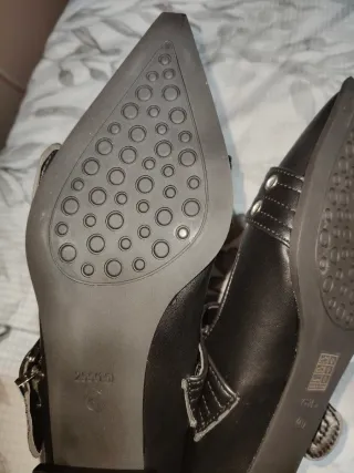 Zapatos planos negros con hebillas