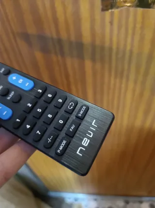 Mando Nevir TV original negro remote control