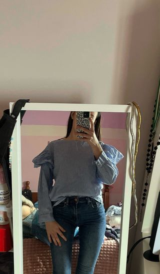 Camisa de rayas azules y blancas