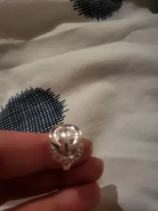 Anillo de plata con diseño entrelazado