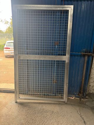 Puerta de hierro 1.20x2.10 sin usar