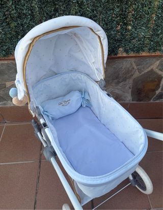 Cochecito de muñecas juguete