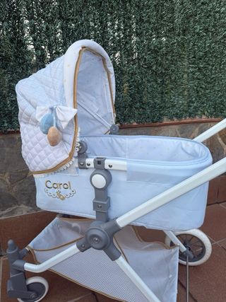 Cochecito de muñecas juguete