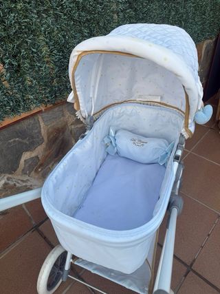 Cochecito de muñecas juguete