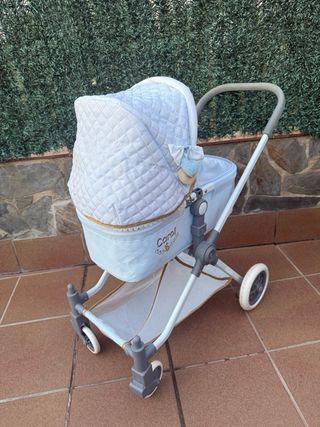 Cochecito de muñecas juguete