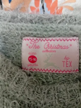 Jersey gris con pompón de conejo