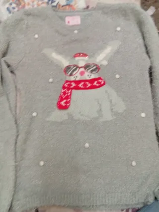 Jersey gris con pompón de conejo