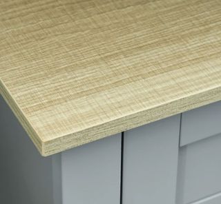 Mueble bajo lavabo gris y madera