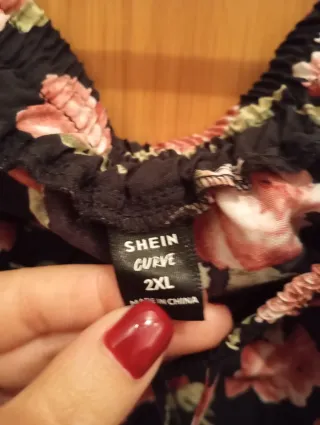 Falda larga floral negra y rosa