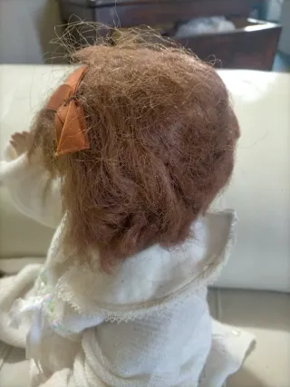 Bambola antica in composizione o celluloide