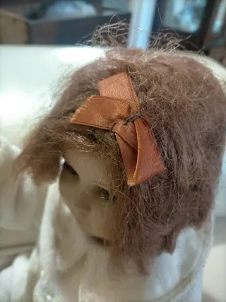 Bambola antica in composizione o celluloide