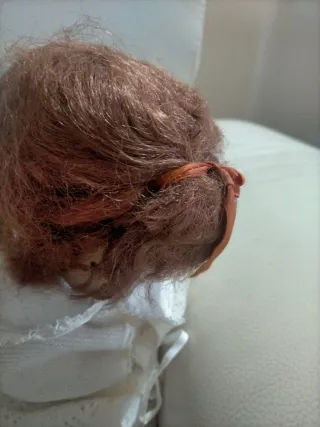 Bambola antica in composizione o celluloide