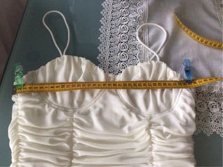 Top arricciato color panna