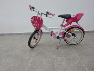 Bicicleta infantil rosa y blanca