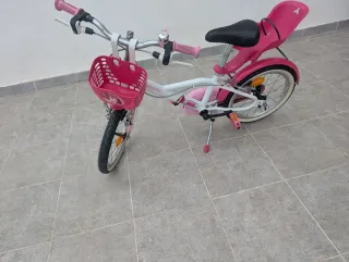 Bicicleta infantil rosa y blanca