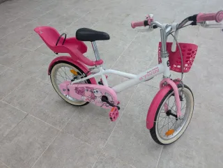 Bicicleta infantil rosa y blanca