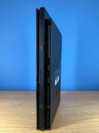 PlayStation 2 Slim Nera e controller