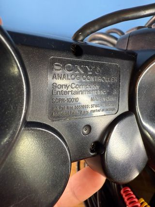 PlayStation 2 Slim Nera e controller