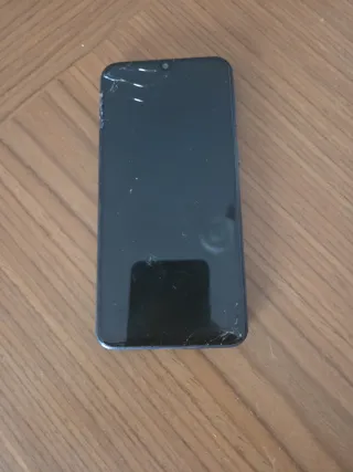 Móvil Samsung Negro Roto