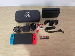Nintendo Switch + 4 Juegos y Funda