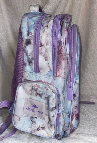 Mochila escolar con estampado floral y número 65