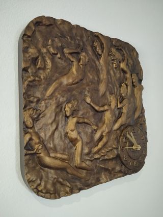 Relógio de parede escultura figuras humanas