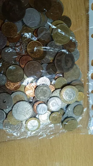 2 Kilos de monedas extranjeras/mundiales