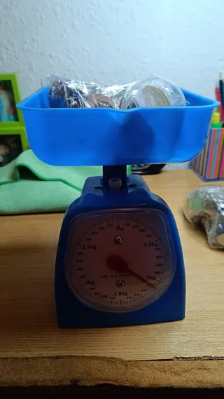 2 Kilos de monedas extranjeras/mundiales